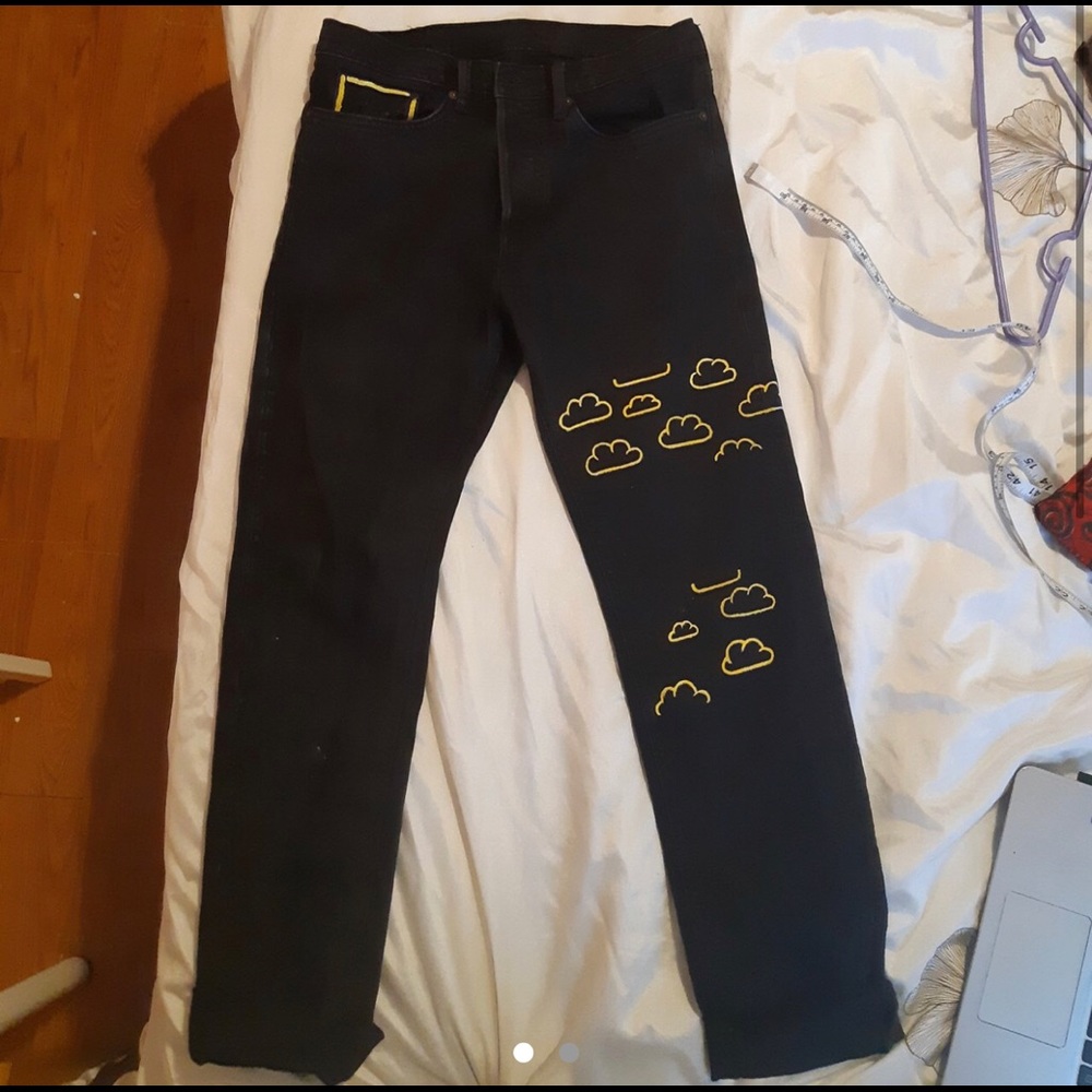 Black jeans with yellow clouds